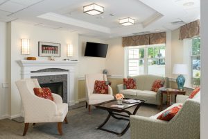 Common space with couches at Scott-Farrar Independent & Assisted Living in Peterborough, NH