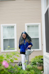 Scott-Farrar senior living residents watering the garden